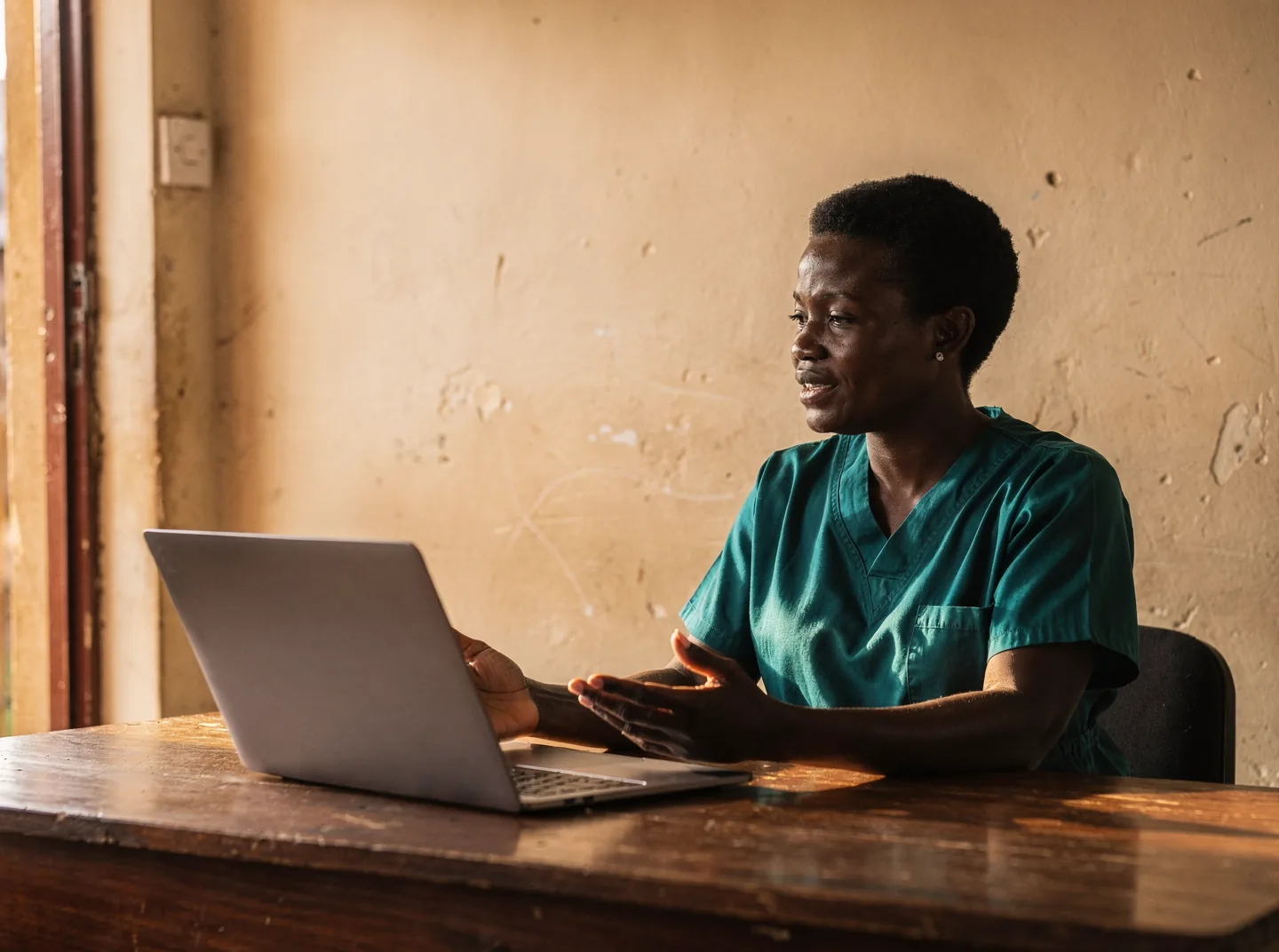 A provider speaking with a patient over a video call